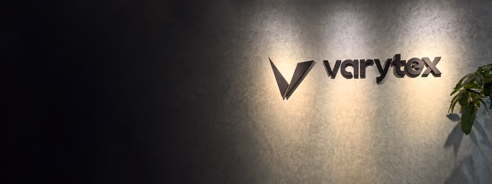 Varytex functional apparel manufacturer office logo wall