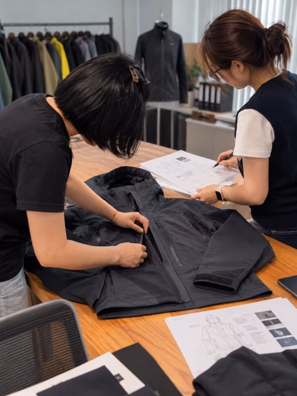 Functional apparel production specification review at Varytex