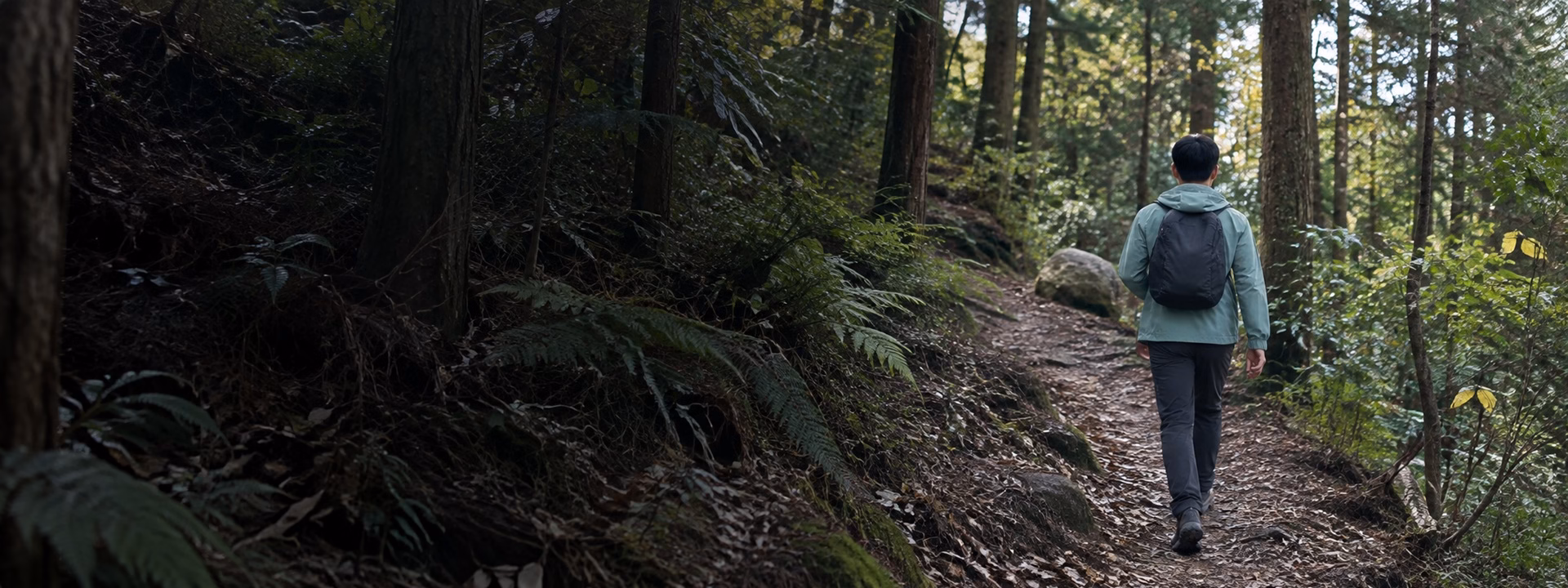 Outdoor functional apparel worn on a forest trail