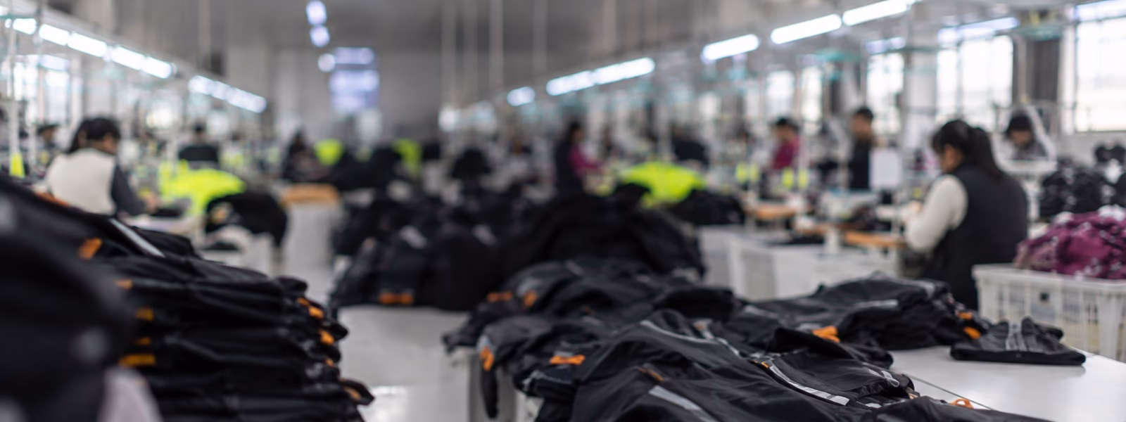 Functional apparel undergoing visual verification during production at Varytex
