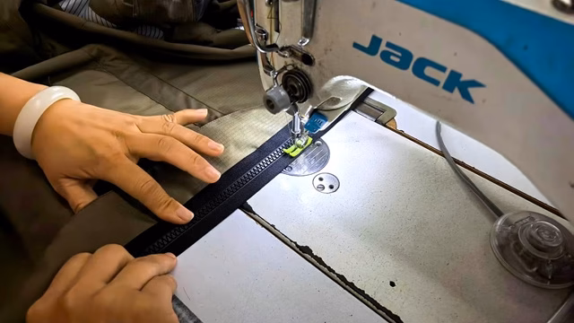 Functional vest and bodywarmer sewing during garment production at Varytex