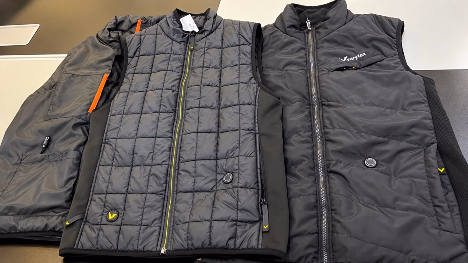 Heated apparel samples with integrated control buttons developed by Varytex